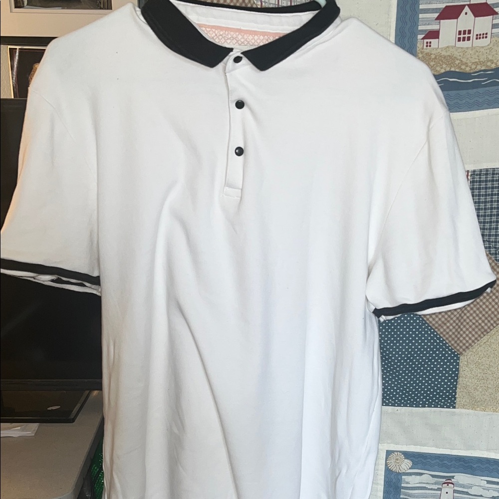 Preowned Chapter White Polo with Black Collar and Sleeve Trim Size Medium .